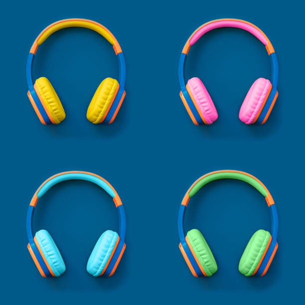 istock Set of four multi-colored headphones on blue background. 1254454189