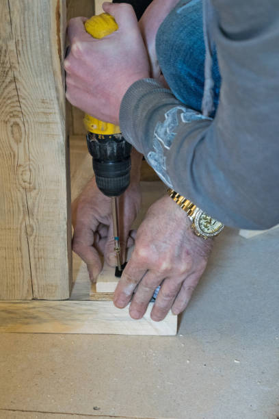 istock A young man with an electric screwdriver 1254455145