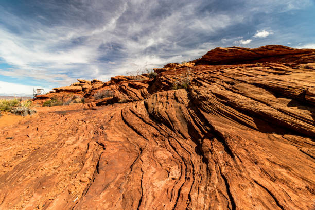 istock Red rock patterns are endless and reach the sky - Page, AZ, USA 1254456630