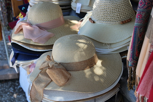 Woman hats on a stall woman hats are used during the summer