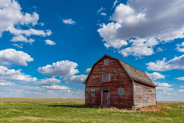 An abandoned red barn on the prairies in Saskatchewan, Canada