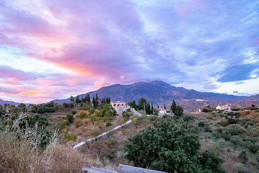 Cloudy sky with colours in a rustic scene in Malaga, Spain