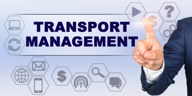 istock Businessman touching virtual screen with his finger. Screen caption - TRANSPORT MANAGEMENT 1254469645