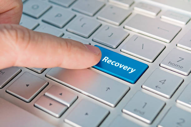 istock RECOVERY word on red keyboard button 1254473646