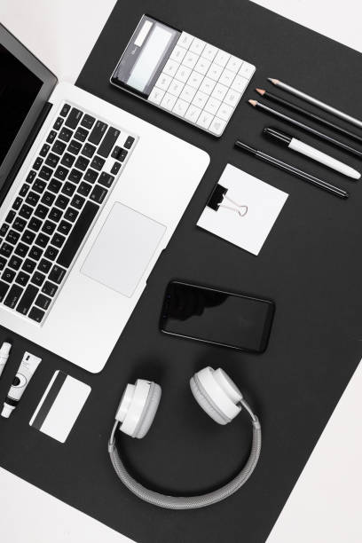 istock Desktop of serious man isolated on black and white background 1254474509