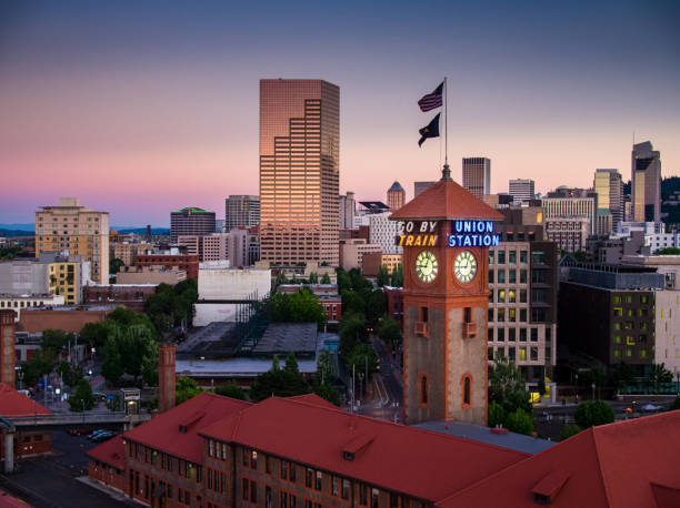 Evening Sunlight on Union Station in Portland Aerial view of Union Station and the skyline of Portland, Oregon at sunset. portland oregon photos stock pictures, royalty-free photos & images