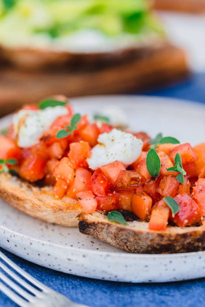 istock Tomato bruschetta with balsamic vinegar and bufala mozzarella 1254476797