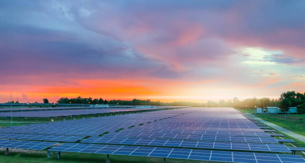Solar plant(solar cell) with sunset, hot climate causes increased power production, Alternative energy to conserve the world's energy, Photovoltaic module idea for clean energy production stock photo