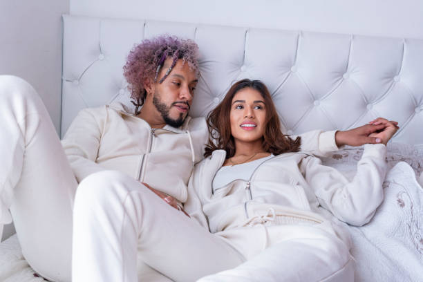 istock Latino ethnic couple in bed during Covid-19 1254482671