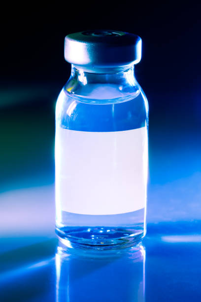 istock Vaccine or drug vial with blank white label 1254485440