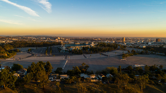 The remote aerial view of Downtown Los Angeles from the Elysian Park at sunset.