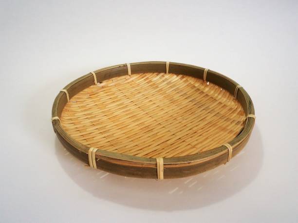 istock Isolated image of shallow bamboo basket 1254488312