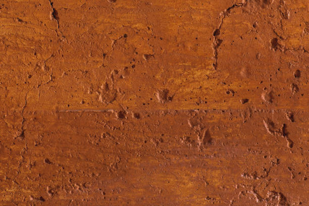 istock Traditional moroccan terracotta colored background. Orange or ocher clay wall texture. Painted shabby concrete. 1254489757
