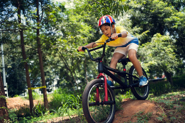 istock Asian boy is training for a happy mountain biking. 1254492143