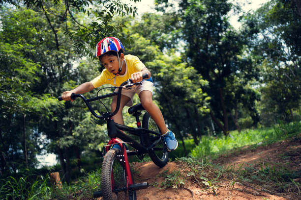 istock Asian boy is training for a happy mountain biking. 1254492157