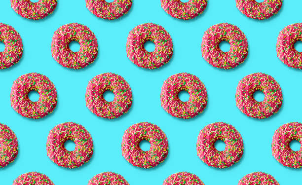 istock Donuts pattern on a mint cyan background. Top view. Flat lay. Summer concept 1254494233