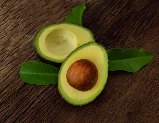 istock Avocado on a brown wooden floor 1254494892