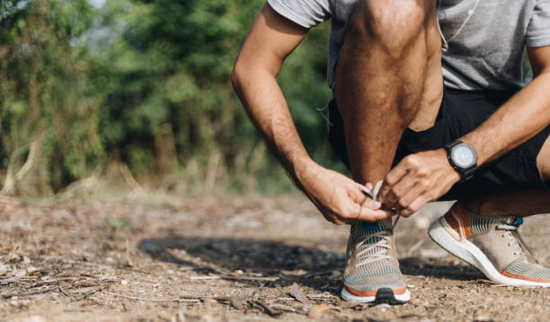 istock man tied shoes with exercise and running 1254497216