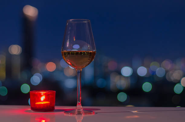 istock A glass of Rose wine with red candle on table 1254499051