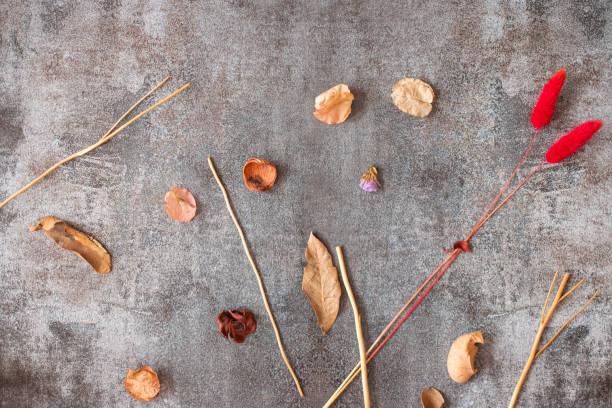 istock Marbling gray background with dried leaves on the edge 1254501250