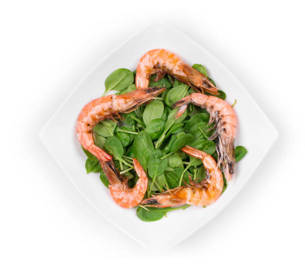 istock Fresh boiled shrimps with spinach. 1254502086