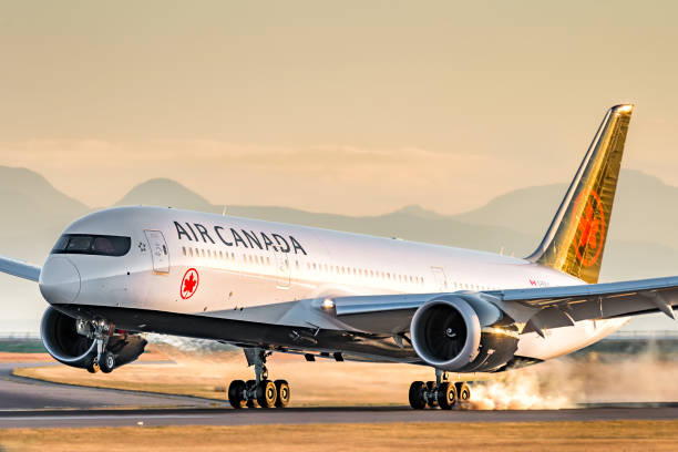 air canada boeing 787 touching down at vancouver international airport - boeing 787 air vehicle airplane imagens e fotografias de stock