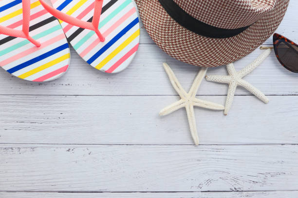 istock flat composition of summer beach accessories on table 1254506305