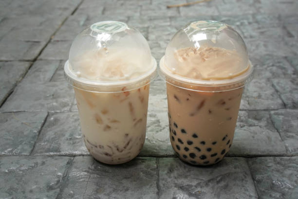 istock selective focus unhealthy iced bubble milk tea in plastic cups 1254507393