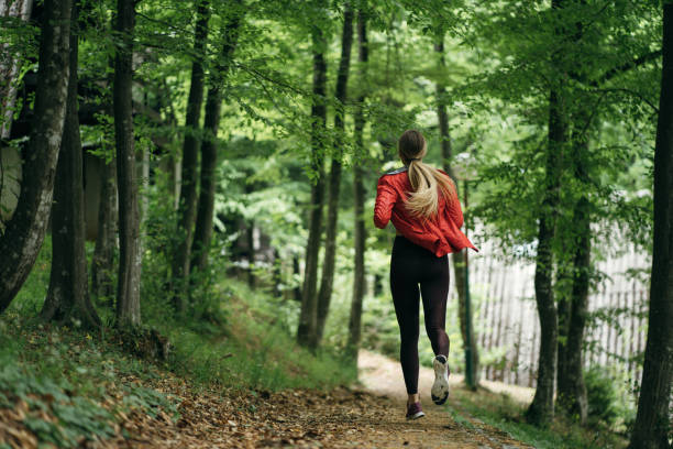 istock Sports woman jogging 1254509267