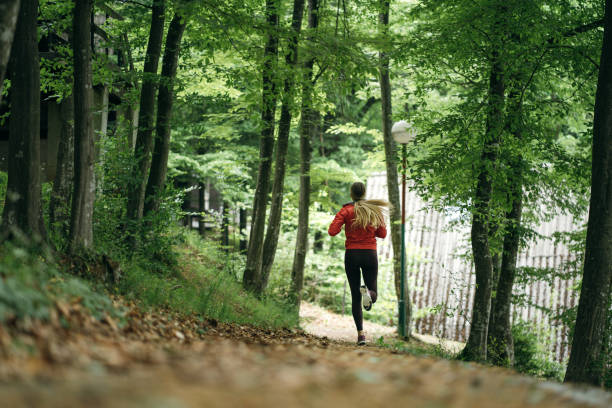 istock Sports woman jogging 1254509279