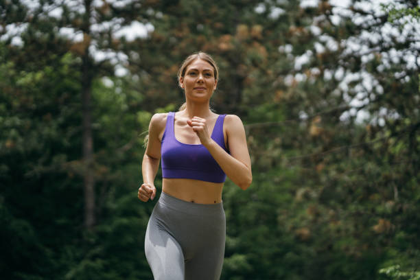 istock Sports woman jogging 1254509291