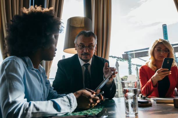 istock Business people meeting in a restaurant 1254510294