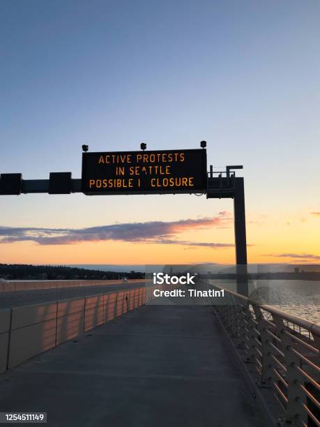 Seattle 520 Bridge With A Sign Warning Stock Photo - Download Image Now - Bridge - Built Structure, Seattle, 2020