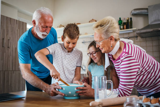 istock Preparing cookies with grandparents 1254512365