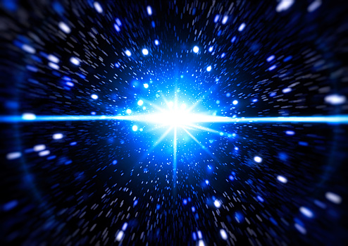 Abstract blue rays shining in outer space