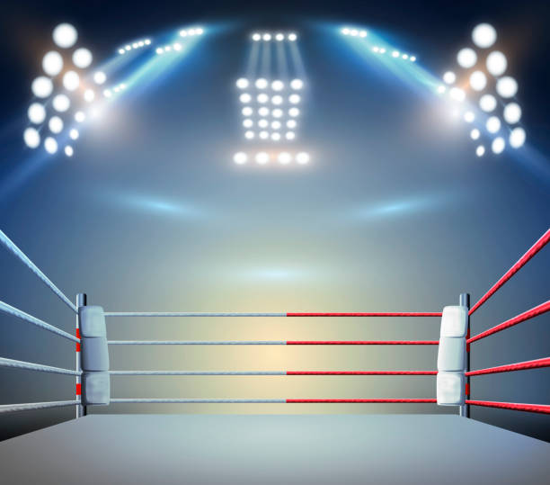 istock boxing ring with illumination by spotlights. digital effect 3d render. 1254515640
