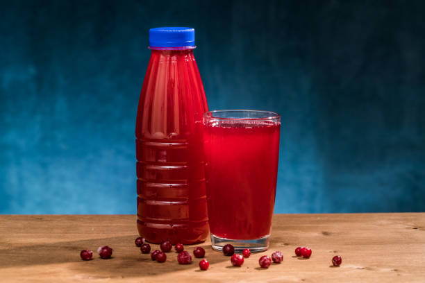 istock berry juice in a glass with berries 1254524212