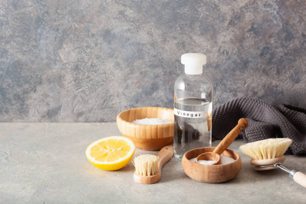 istock zero waste eco friendly cleaning concept. wooden brushes, lemon, baking soda, vinegar 1254526722