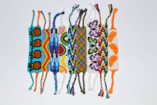 istock Woven friendship bracelets with alpha and normal patterns handmade of thread 1254529592