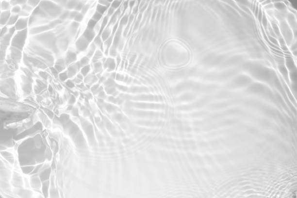 istock desaturated transparent clear calm water surface texture 1254533810