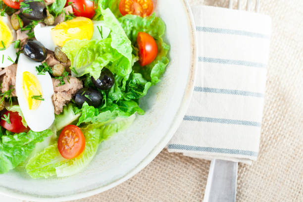 istock Chef's salad with tuna fish, black olive and egg. 1254539328