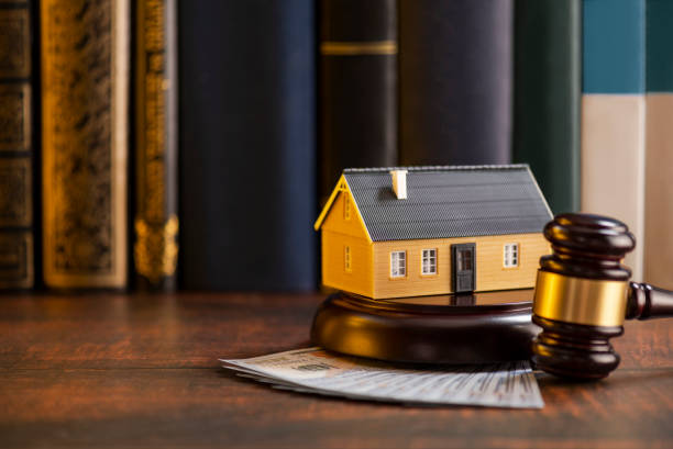 Mini house and court mallet on a table