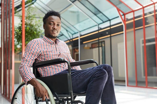 istock African man sitting in wheelchair 1254543456