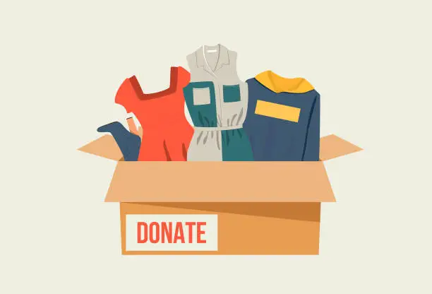 Vector illustration of Vector cloth donation box with different clothes