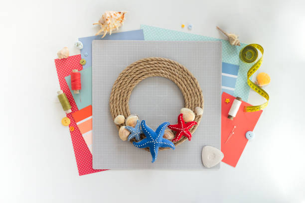 istock DIY instruction. Step by step tutorial. Making Summer decor - wreath of rope with sea stars made of felt. Craft tools and supplies. Step 7 - Final 1254549666