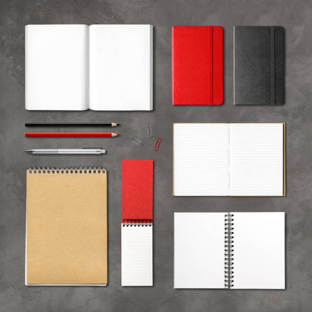 istock stationery books and notebooks on a concrete background 1254549738