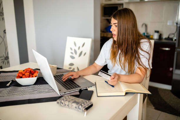 istock She is very negative surprised with a bill she received after online shopping 1254549929