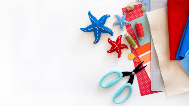 istock DIY instruction. Step by step tutorial. Making Summer decor - wreath of rope with sea stars made of felt. Craft tools and supplies 1254550071
