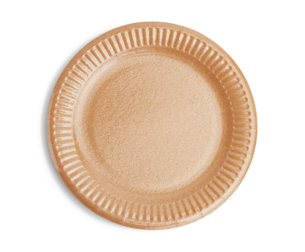 istock empty round brown disposable plate made from recycled materials isolated on white background 1254550194