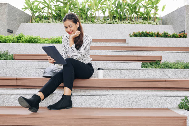 istock Business lady resting on bench 1254550837